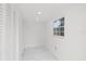 Hallway featuring recessed lighting, marble floors, a window and closet at 1413 E 108Th Ave, Tampa, FL 33612