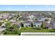 Aerial shot showcases the property's backyard and nearby community at 14403 Dunrobin Dr, Wimauma, FL 33598