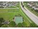 This aerial shows a basketball court and a dog park, perfect for residents to enjoy active lifestyles at 14460 English Lavender Dr, Wimauma, FL 33598