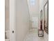 Bright entryway featuring a tiled floor, a tall ceiling, and decorative mirrors at 14460 English Lavender Dr, Wimauma, FL 33598