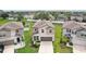 Well-maintained two story home featuring a two-car garage and inviting front lawn at 14460 English Lavender Dr, Wimauma, FL 33598