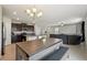 Spacious open-concept kitchen and living room area at 14460 English Lavender Dr, Wimauma, FL 33598