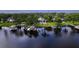 Waterfront home with private dock, boat lift, and lush backyard at 15012 Maurine Cove Ln, Odessa, FL 33556