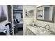 Bright bathroom features vanity with a vessel sink and an adjacent bedroom view at 1847 Shore Drive S # 415, South Pasadena, FL 33707