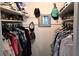 Walk-in closet featuring shelving and hanging storage for clothes and accessories at 1847 Shore Drive S # 415, South Pasadena, FL 33707