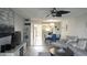 Cozy living area featuring a dining area, an open kitchen view, and comfortable seating perfect for relaxation at 1847 Shore Drive S # 415, South Pasadena, FL 33707