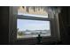 Scenery of a cityscape, as seen through a window at 1847 Shore Drive S # 415, South Pasadena, FL 33707