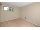 Bedroom with carpet floors, neutral walls and a window at 1881 Lichen Ln # B, Clearwater, FL 33760