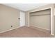 Bedroom with carpet floors and a closet at 1881 Lichen Ln # B, Clearwater, FL 33760
