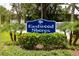 Eastwood Shores community sign with landscaping at 1881 Lichen Ln # B, Clearwater, FL 33760