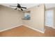 Cozy dining area featuring terra cotta tile flooring and an open view into the kitchen at 1881 Lichen Ln # B, Clearwater, FL 33760