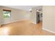 Spacious living room with tile flooring, a ceiling fan, and natural light at 1881 Lichen Ln # B, Clearwater, FL 33760