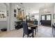 Elegant dining area featuring decorative wall art, and stylish chandelier at 19104 Cellini Pl, Lutz, FL 33558