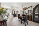 Spacious living area with dining table, chess set, decor, and an inviting ambiance at 19104 Cellini Pl, Lutz, FL 33558