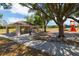 The picnic area features a sheltered space with tables and seating, perfect for outdoor gatherings and relaxation at 19104 Cellini Pl, Lutz, FL 33558