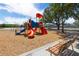 Community playground with play equipment, swings, and benches at 19104 Cellini Pl, Lutz, FL 33558