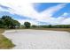 A well-maintained volleyball court provides a space for recreational play and social activity at 19104 Cellini Pl, Lutz, FL 33558