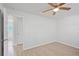 Cozy bedroom featuring sleek, wood-look flooring and ample natural light for a bright and inviting space at 212 Gay Rd, Seffner, FL 33584