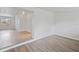Living room boasting an open floor plan, neutral walls, and durable flooring at 212 Gay Rd, Seffner, FL 33584