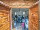 Interior view of a wooden shed packed with boxes, containers, and various household items at 2160 Ne Coachman Rd, Clearwater, FL 33765
