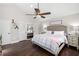 Spacious main bedroom with hardwood flooring, ceiling fan, closet, and lots of natural light at 2306 S Valrico Rd, Valrico, FL 33596