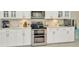 Beautiful kitchen featuring stainless steel appliances and a modern design at 2435 Fox Forest Dr, Lutz, FL 33549