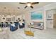 Open-concept living space showcasing modern furnishings, natural light, a stylish kitchen, and elegant decor at 2435 Fox Forest Dr, Lutz, FL 33549