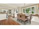 Dining room featuring a table, seating and a view of the fireplace at 258 14Th Ne Ave, St Petersburg, FL 33701