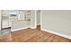 Bright kitchen featuring butcher block countertop, open shelving, and hardwood floors at 258 14Th Ne Ave, St Petersburg, FL 33701