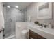 This is a bathroom featuring a spacious shower and modern sink at 318 W Haya St, Tampa, FL 33603
