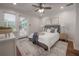 This is a bright and spacious main bedroom featuring a ceiling fan at 318 W Haya St, Tampa, FL 33603