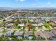 Scenic aerial view of waterfront community showing neighborhood homes at 338 7Th N Ave, Tierra Verde, FL 33715