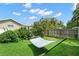 Relaxing backyard scene with a hammock, lush landscaping, and a tranquil atmosphere at 338 7Th N Ave, Tierra Verde, FL 33715