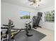 The exercise room features exercise equipment and a window with natural light at 338 7Th N Ave, Tierra Verde, FL 33715