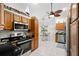 Modern kitchen featuring stainless steel appliances and granite countertops at 338 7Th N Ave, Tierra Verde, FL 33715
