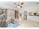 Spacious living room offers ample seating, tile floors, and plenty of natural light at 338 7Th N Ave, Tierra Verde, FL 33715