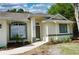 Charming single-story home featuring a well-manicured lawn and inviting entrance at 3405 Silver Glen Ct, Plant City, FL 33566
