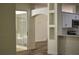 Living room space with access to a screened lanai and easy access to the eat-in kitchen at 3405 Silver Glen Ct, Plant City, FL 33566