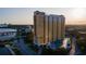 Stunning aerial view showcasing a modern high-rise condo building near the water at 345 Bayshore Blvd # 508, Tampa, FL 33606
