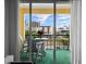View from balcony with furniture looking out at a city skyline at 345 Bayshore Blvd # 508, Tampa, FL 33606