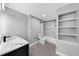 Full bathroom featuring modern fixtures, a shower-tub combo, and shelving at 345 Bayshore Blvd # 508, Tampa, FL 33606