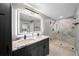 Modern bathroom features a double vanity with marble countertop and glass shower at 345 Bayshore Blvd # 508, Tampa, FL 33606