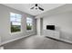 Bright bedroom featuring wood floors, ceiling fan, and large windows with a view of the water at 345 Bayshore Blvd # 508, Tampa, FL 33606