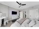 Stylish bedroom with a fan, TV, and a vanity area at 345 Bayshore Blvd # 508, Tampa, FL 33606