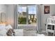 Bright bedroom featuring a large window with city views and stylish decor at 345 Bayshore Blvd # 508, Tampa, FL 33606