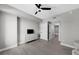A bedroom with wood floors, ceiling fan, and ensuite bathroom at 345 Bayshore Blvd # 508, Tampa, FL 33606