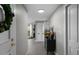 Bright hallway featuring neutral walls, wood-look floors, modern decor and beautiful interior doors at 345 Bayshore Blvd # 508, Tampa, FL 33606