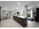 Open concept kitchen with a large island, modern appliances, and views from the adjacent balcony at 345 Bayshore Blvd # 508, Tampa, FL 33606