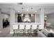 Eat in kitchen featuring seating at bar, modern appliances, and view of adjacent living spaces at 345 Bayshore Blvd # 508, Tampa, FL 33606