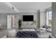 Sophisticated living room featuring stylish furniture, modern decor, and a large screen television at 345 Bayshore Blvd # 508, Tampa, FL 33606